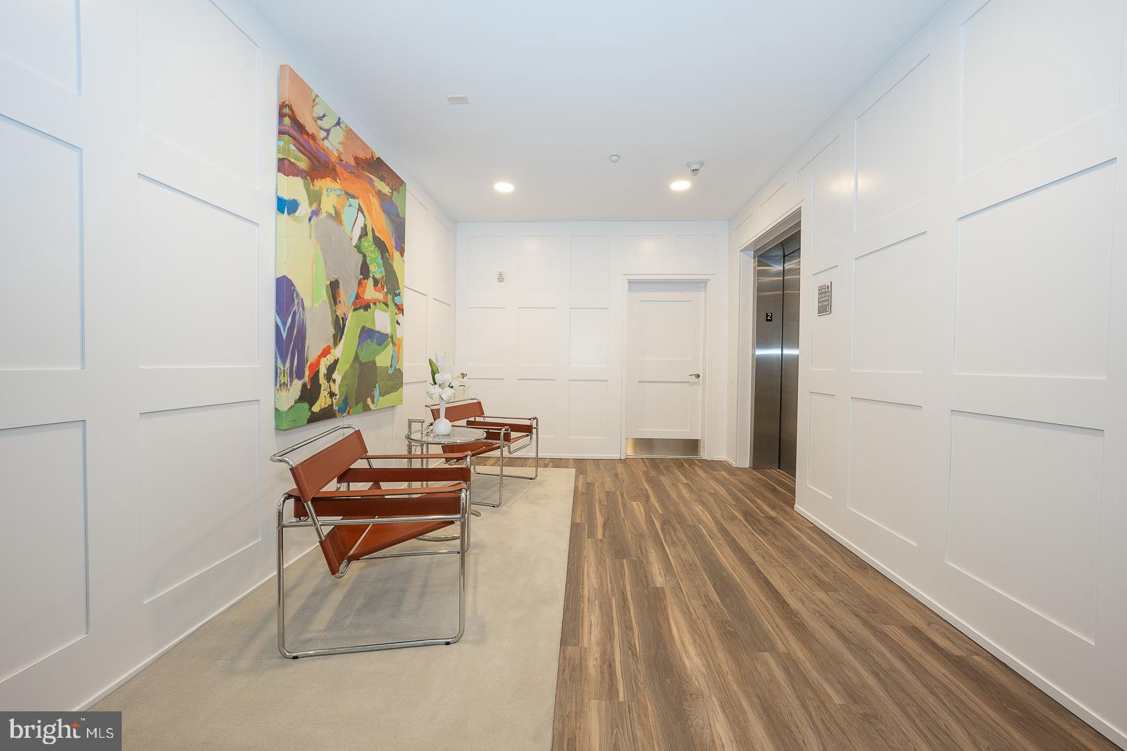 123 Iron Works Way Wayne, PA 19087 - Photo 5 of 38 Elevator to 2nd floor Seating Area