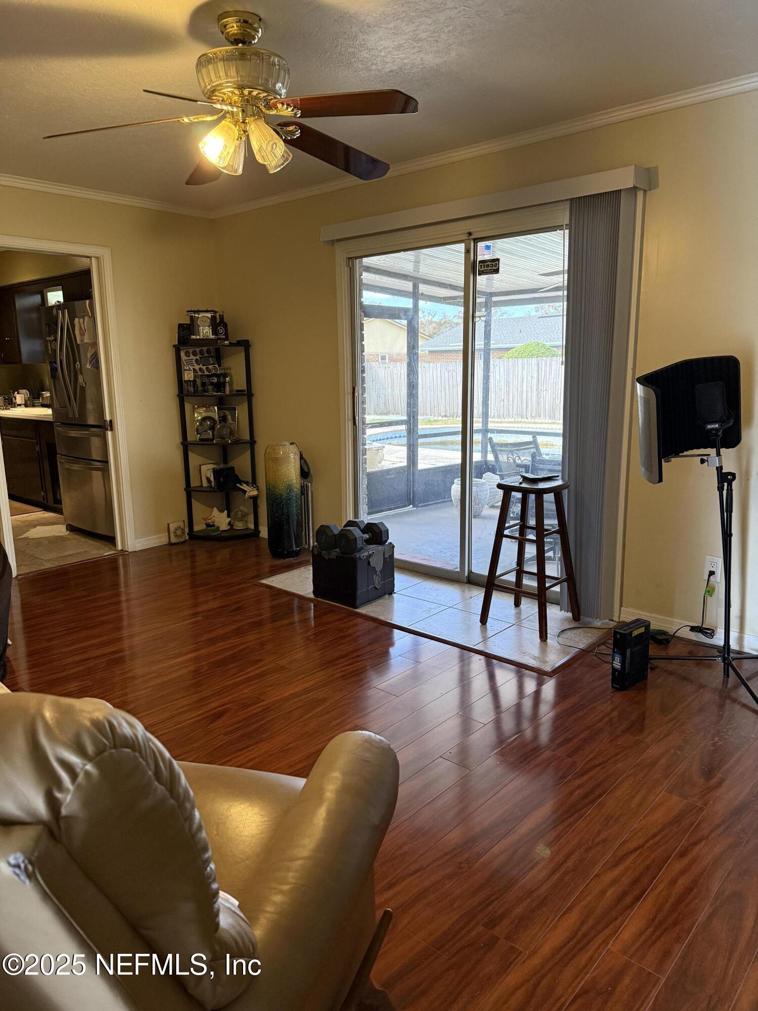 3976 Raintree Road Jacksonville, FL 32277 - Photo 8 of 13 FAMILY ROOM-VIEW 3