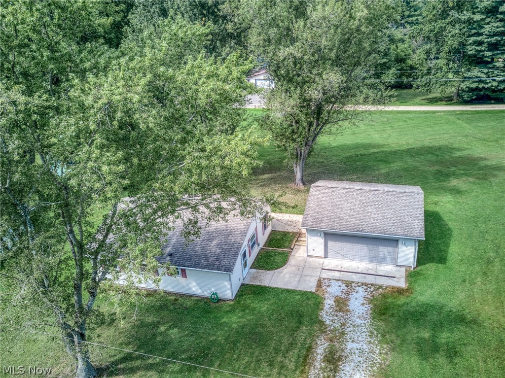 6503 Garrett Road Ravenna, OH 44266 - Photo 38 of 50 Detached garage structure with a gambrel roof and a concrete apron