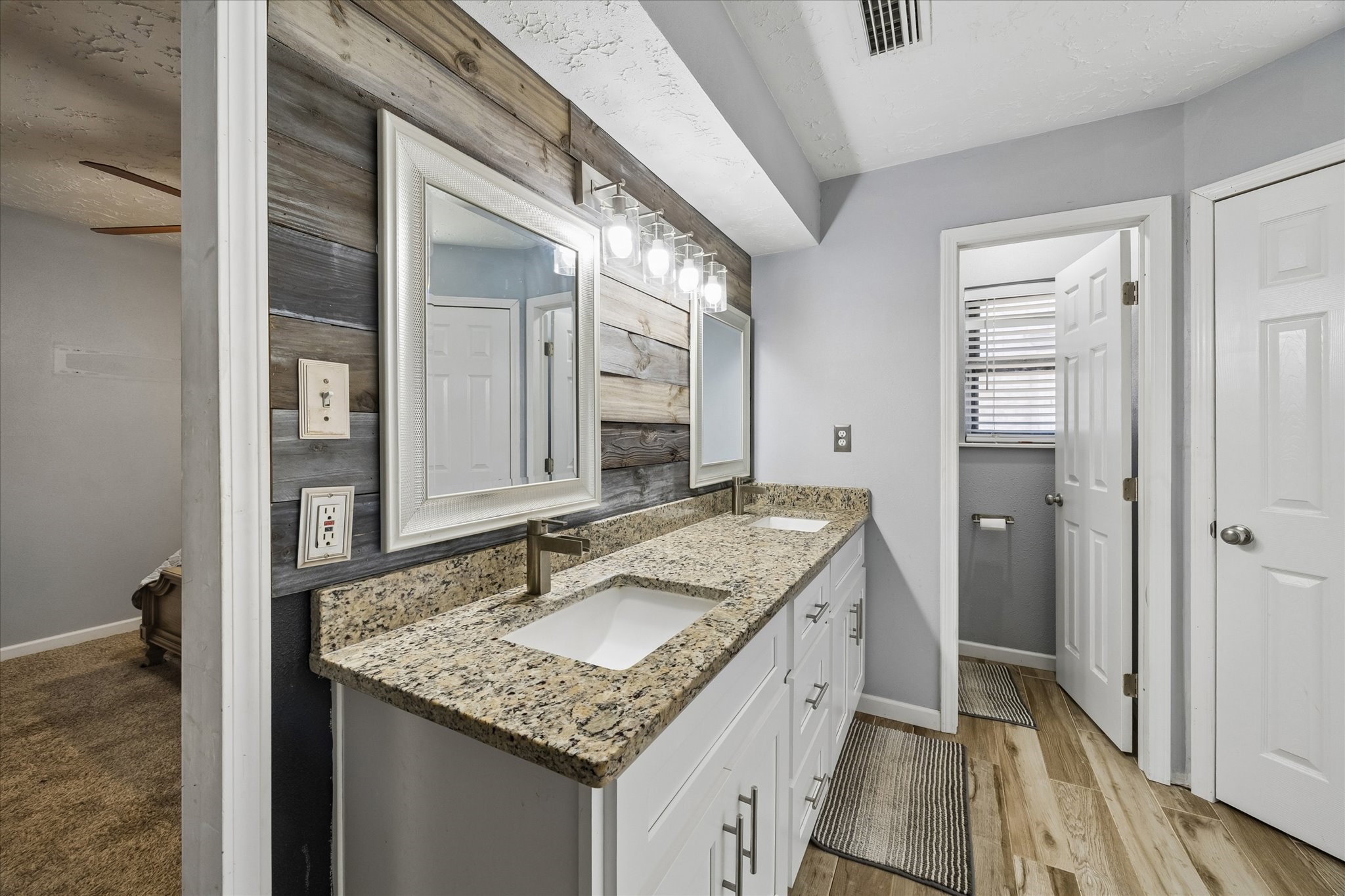 23115 Stepinwolf Lane Spring, TX 77373 - Photo 17 of 18 Dual vanity with plenty of granite countertop space.
