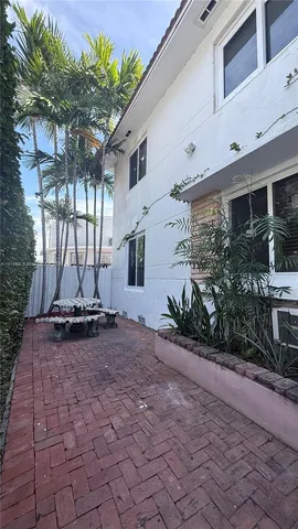 a view of a house with a street