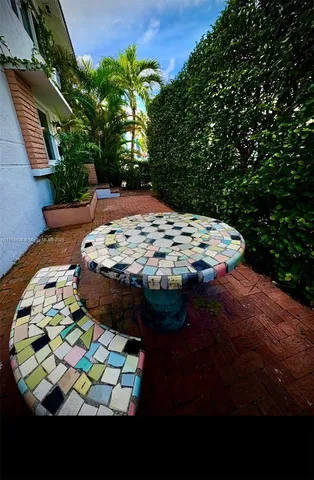 a close up of a vase of flowers