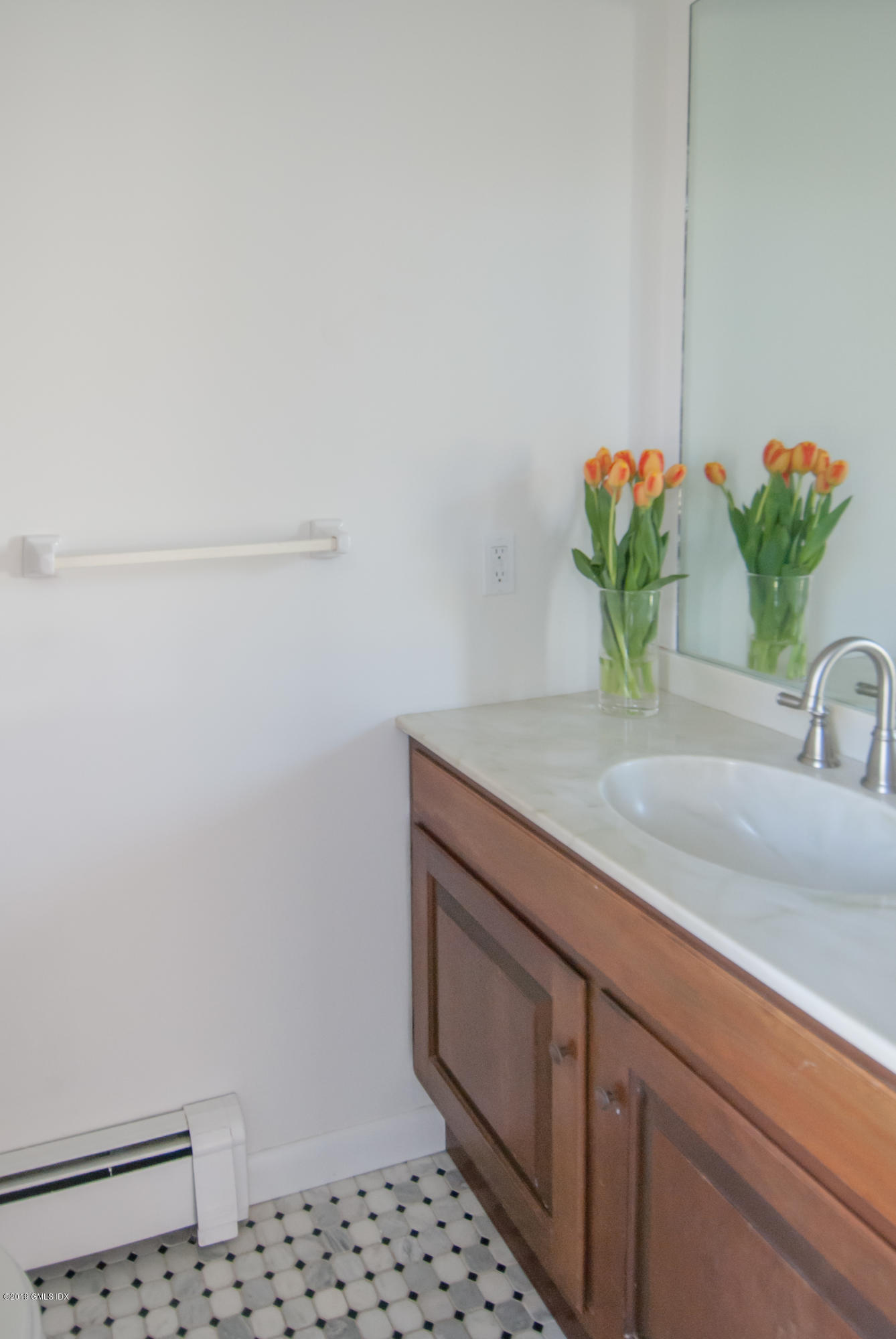 25 Harkim Road Greenwich, CT 06831 - Photo 7 of 14 a close view of sink and tap