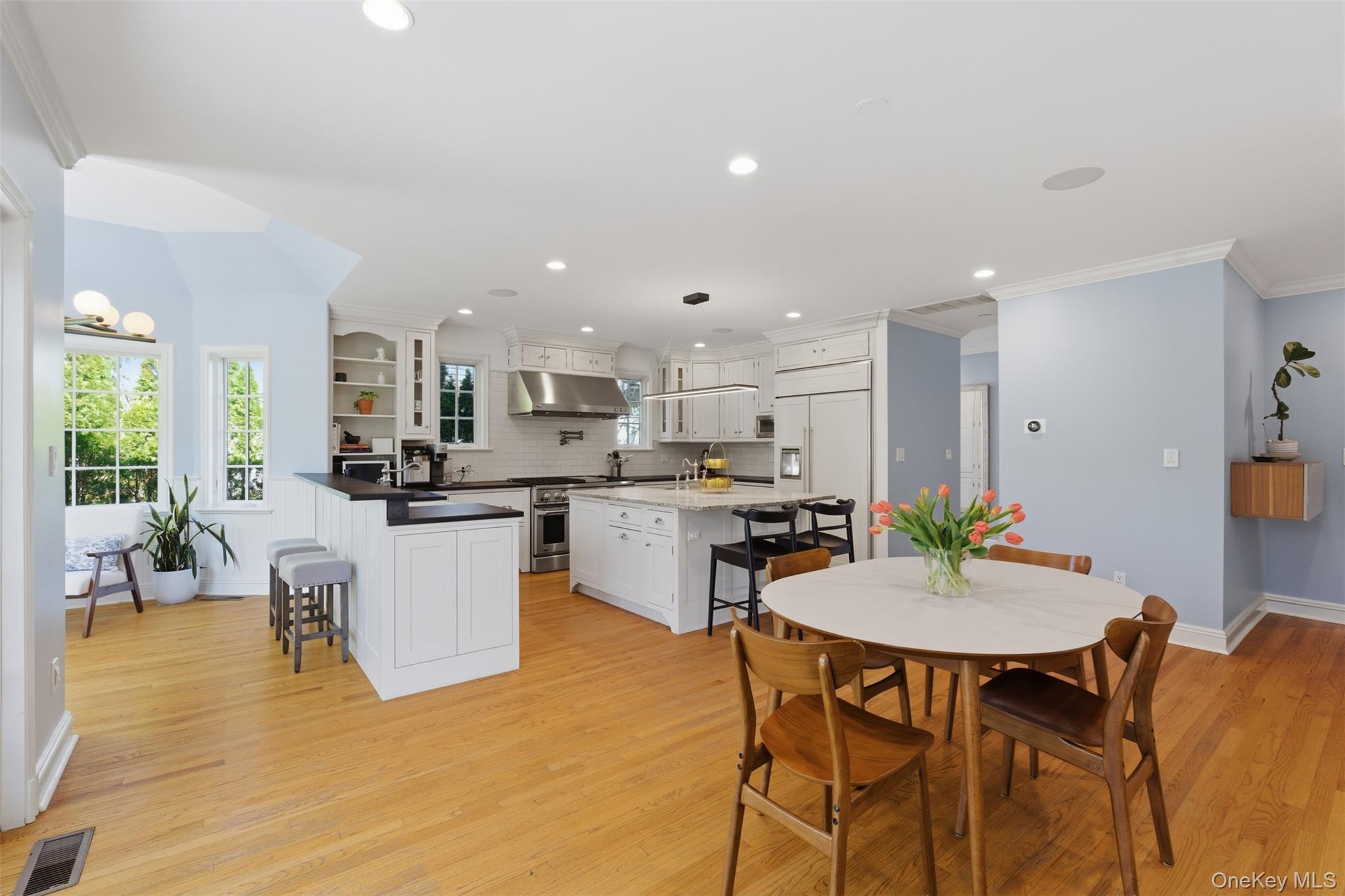 42 Mulberry Lane New Rochelle, NY 10804 - Photo 11 of 43 a view of kitchen with dining table and chairs