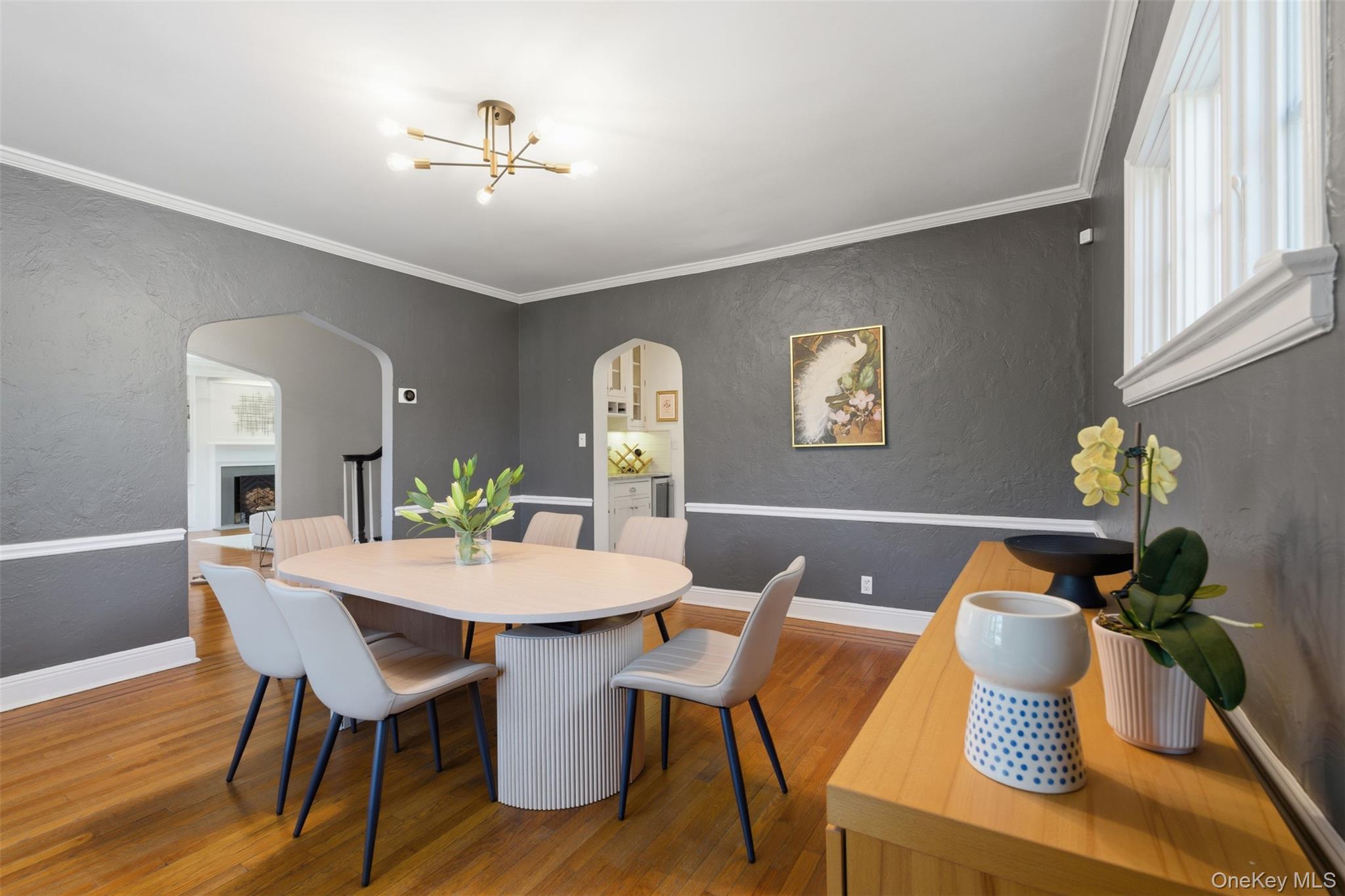 42 Mulberry Lane New Rochelle, NY 10804 - Photo 17 of 43 a view of a dining room with furniture wooden floor and chandelier