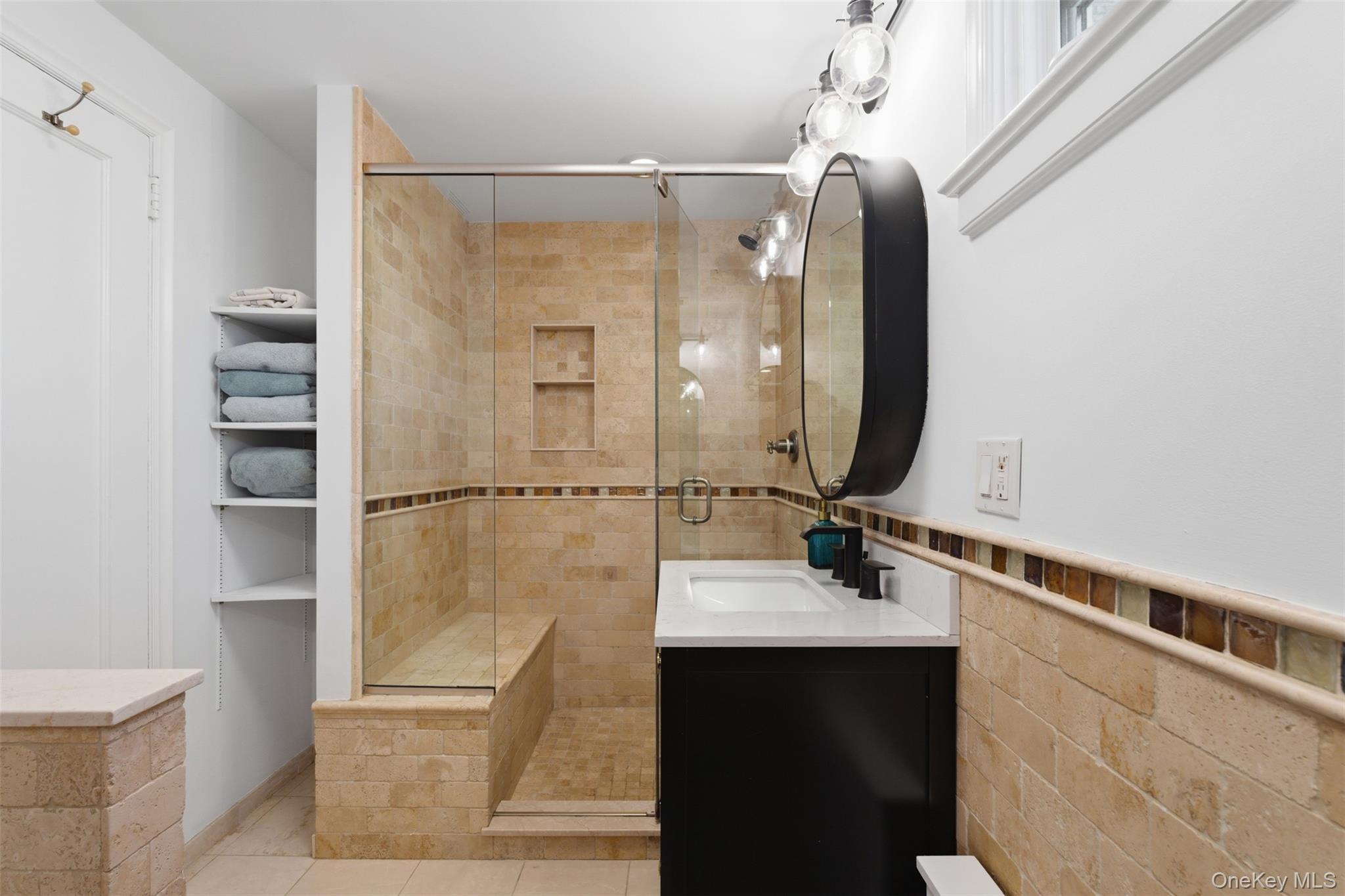 42 Mulberry Lane New Rochelle, NY 10804 - Photo 24 of 43 a bathroom with a sink and a mirror