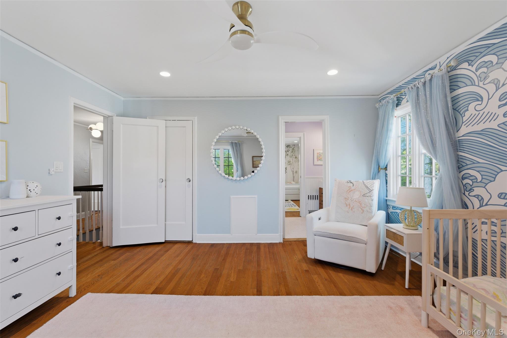 42 Mulberry Lane New Rochelle, NY 10804 - Photo 27 of 43 a living room with furniture and a wooden floor