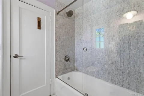 a bathroom with a bathtub
