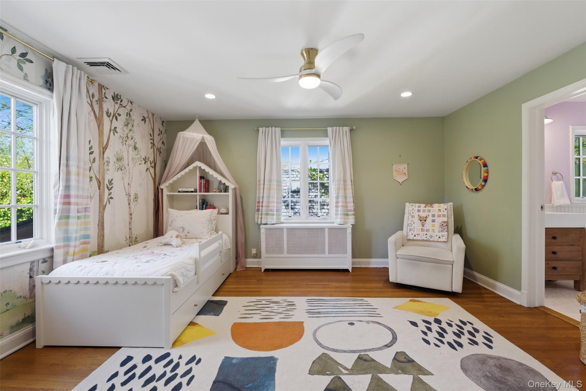 42 Mulberry Lane New Rochelle, NY 10804 - Photo 30 of 43 a living room with furniture and a rug