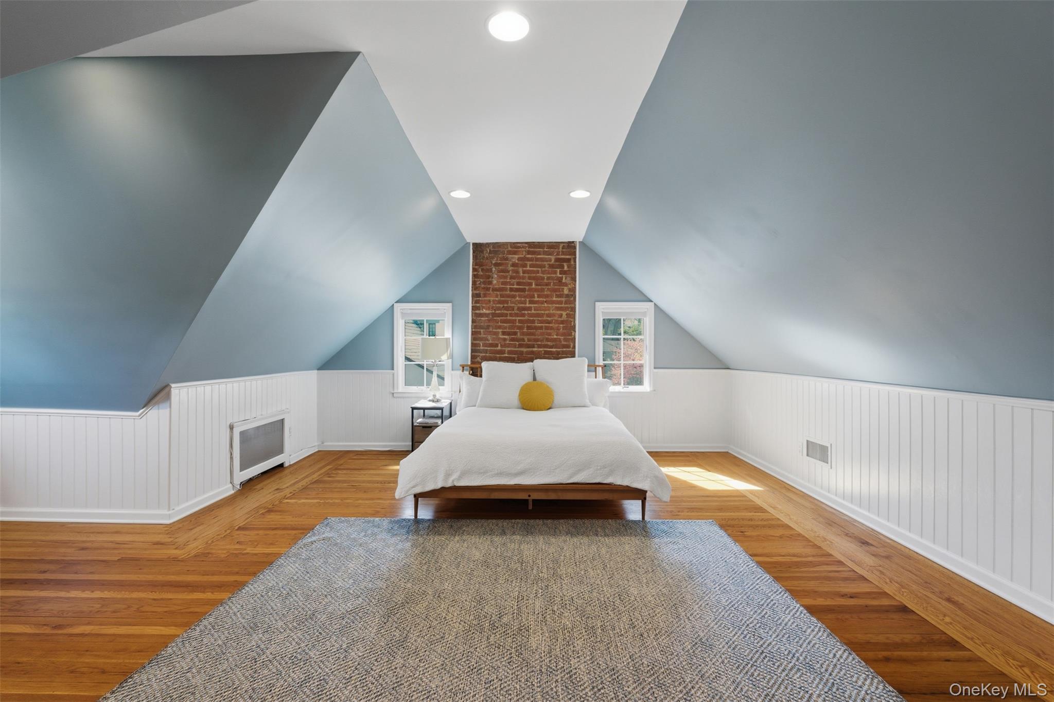 42 Mulberry Lane New Rochelle, NY 10804 - Photo 32 of 43 a spacious bedroom with a bed and window