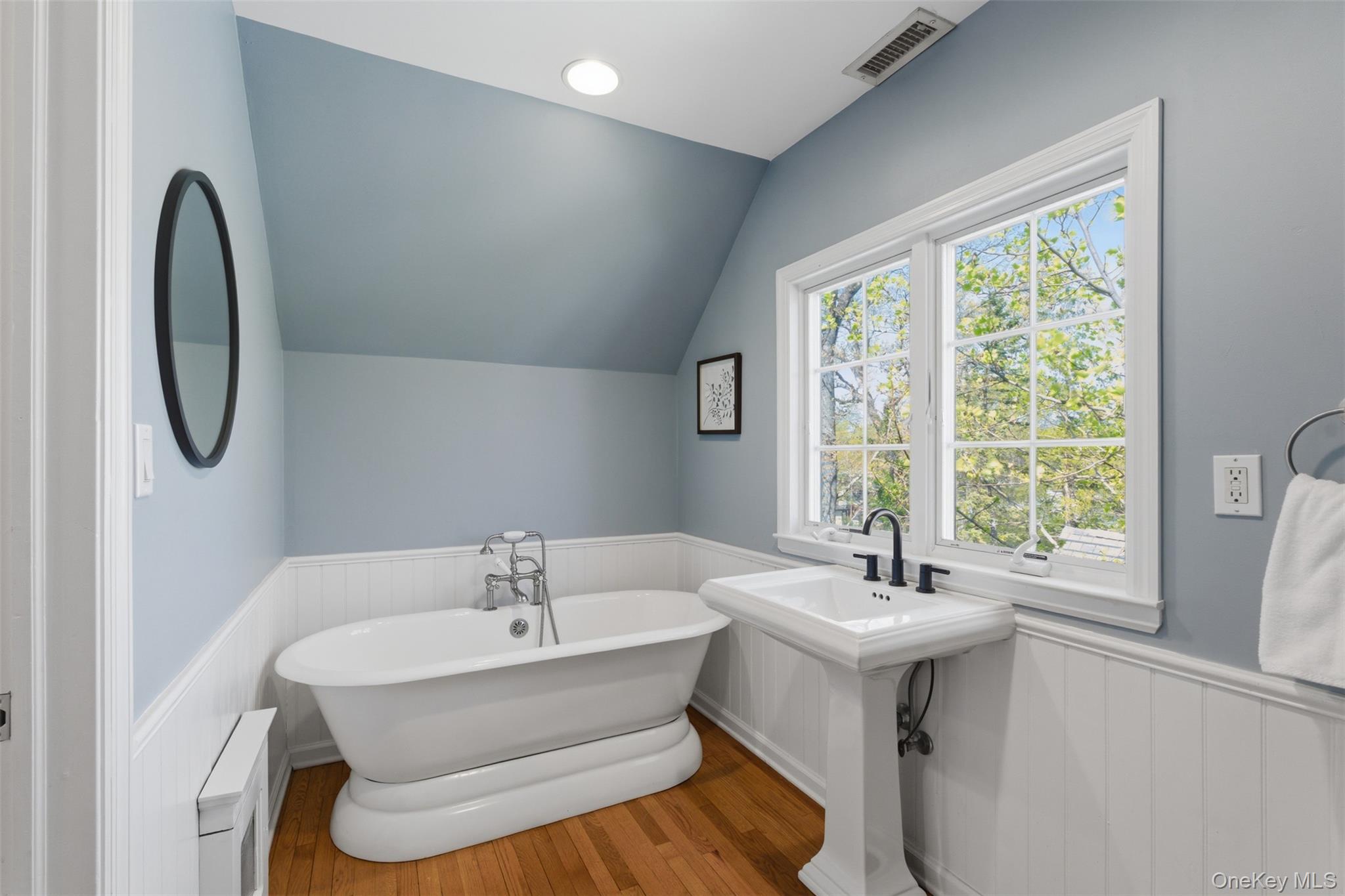 42 Mulberry Lane New Rochelle, NY 10804 - Photo 34 of 43 a bathroom with a sink and a window