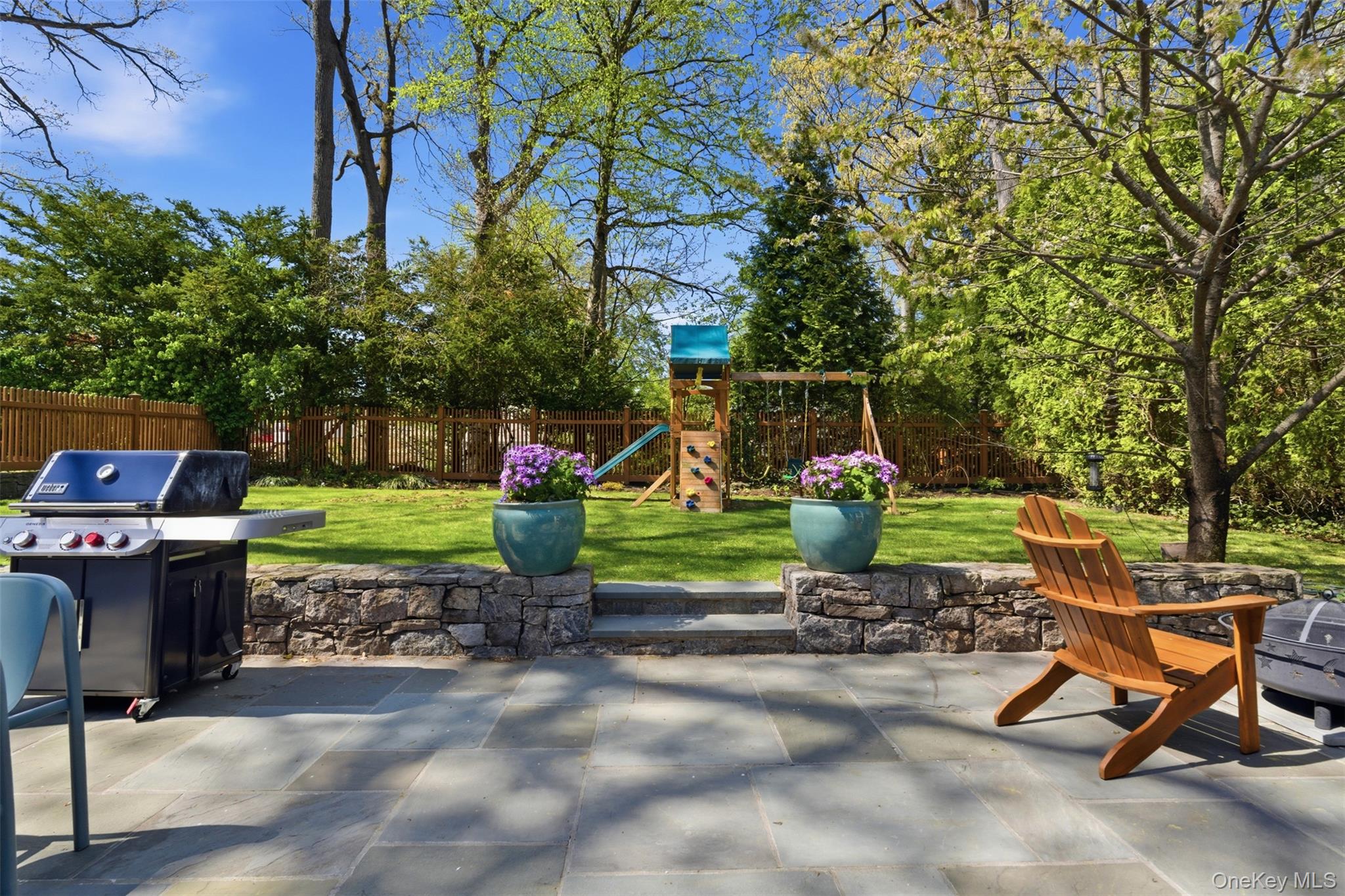 42 Mulberry Lane New Rochelle, NY 10804 - Photo 35 of 43 a view of a backyard with wooden fence