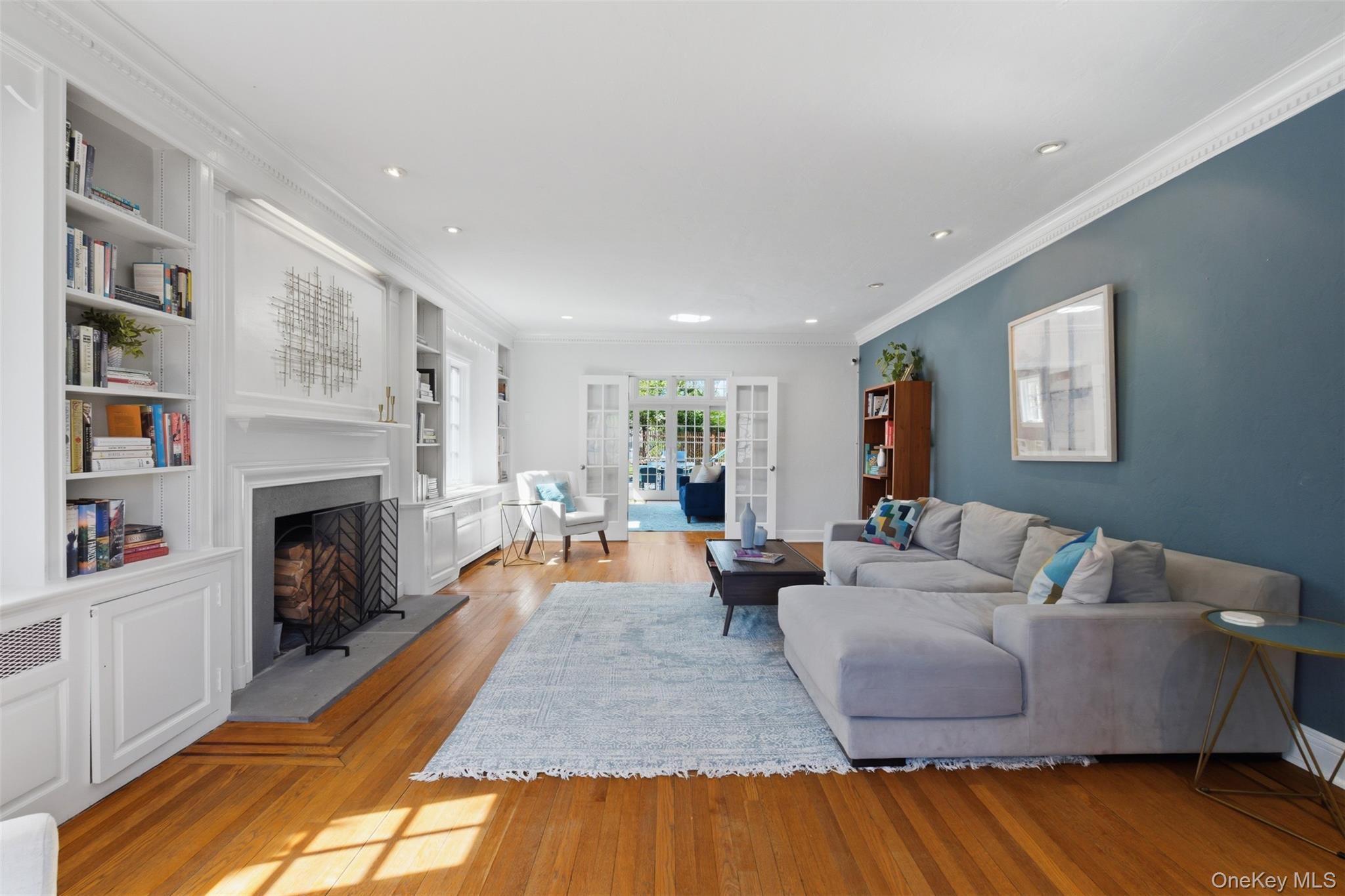42 Mulberry Lane New Rochelle, NY 10804 - Photo 5 of 43 a living room with furniture and a fireplace