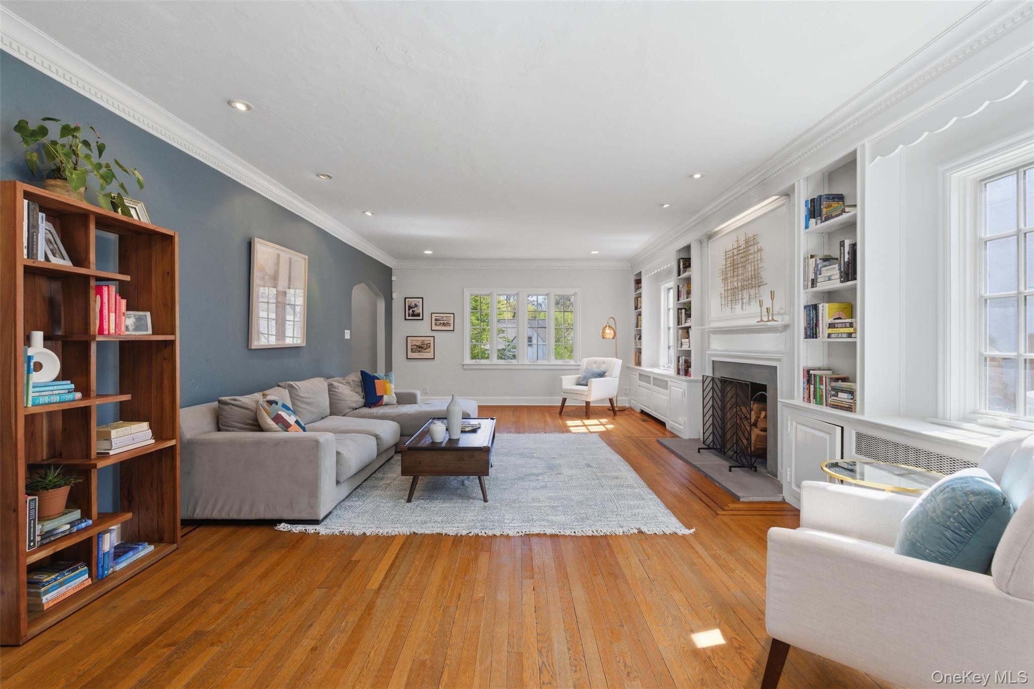 42 Mulberry Lane New Rochelle, NY 10804 - Photo 6 of 43 a living room with furniture and a fireplace