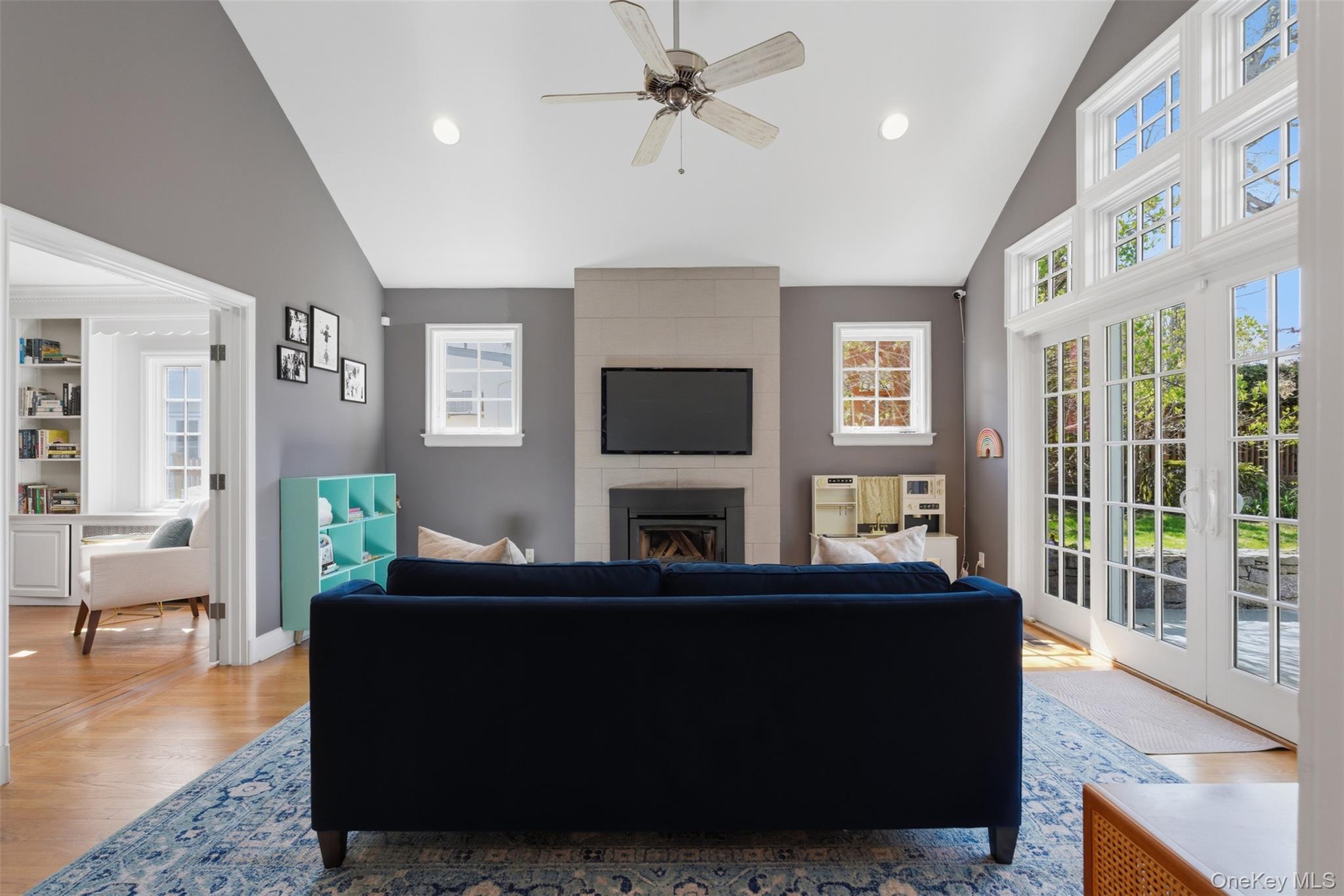 42 Mulberry Lane New Rochelle, NY 10804 - Photo 8 of 43 a living room with fireplace furniture and a flat screen tv