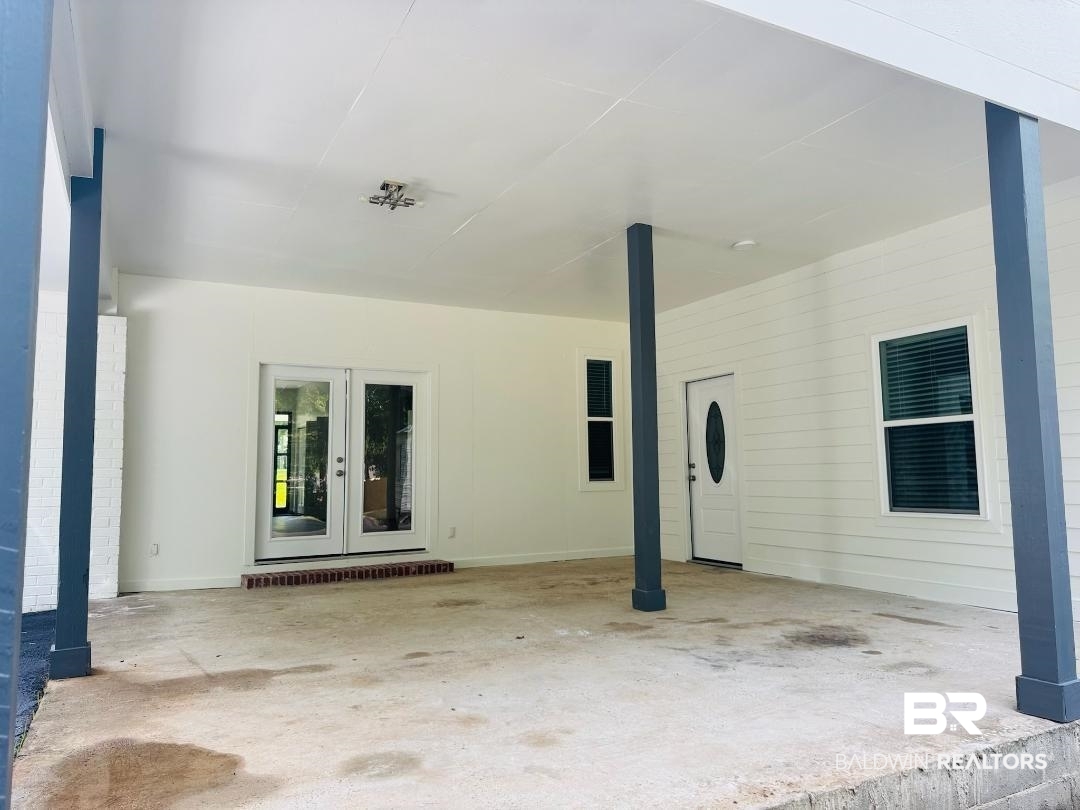 2663 Demetropolis Road Mobile, AL 36693 - Photo 25 of 26 View of patio / terrace with french doors