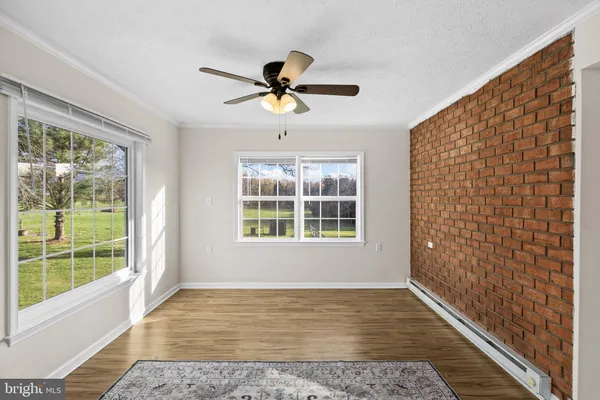 a view of an empty room and window