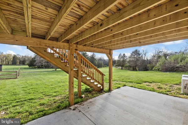 a view of a yard with an outdoor space