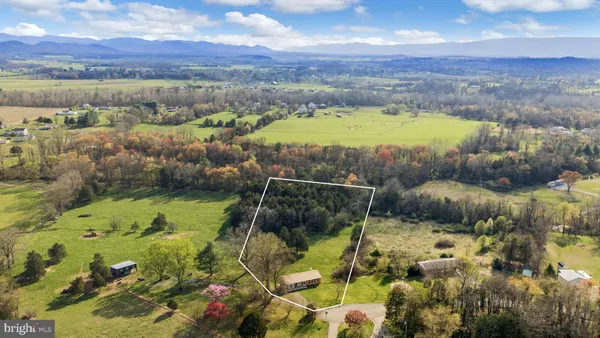 a view of lake with mountain
