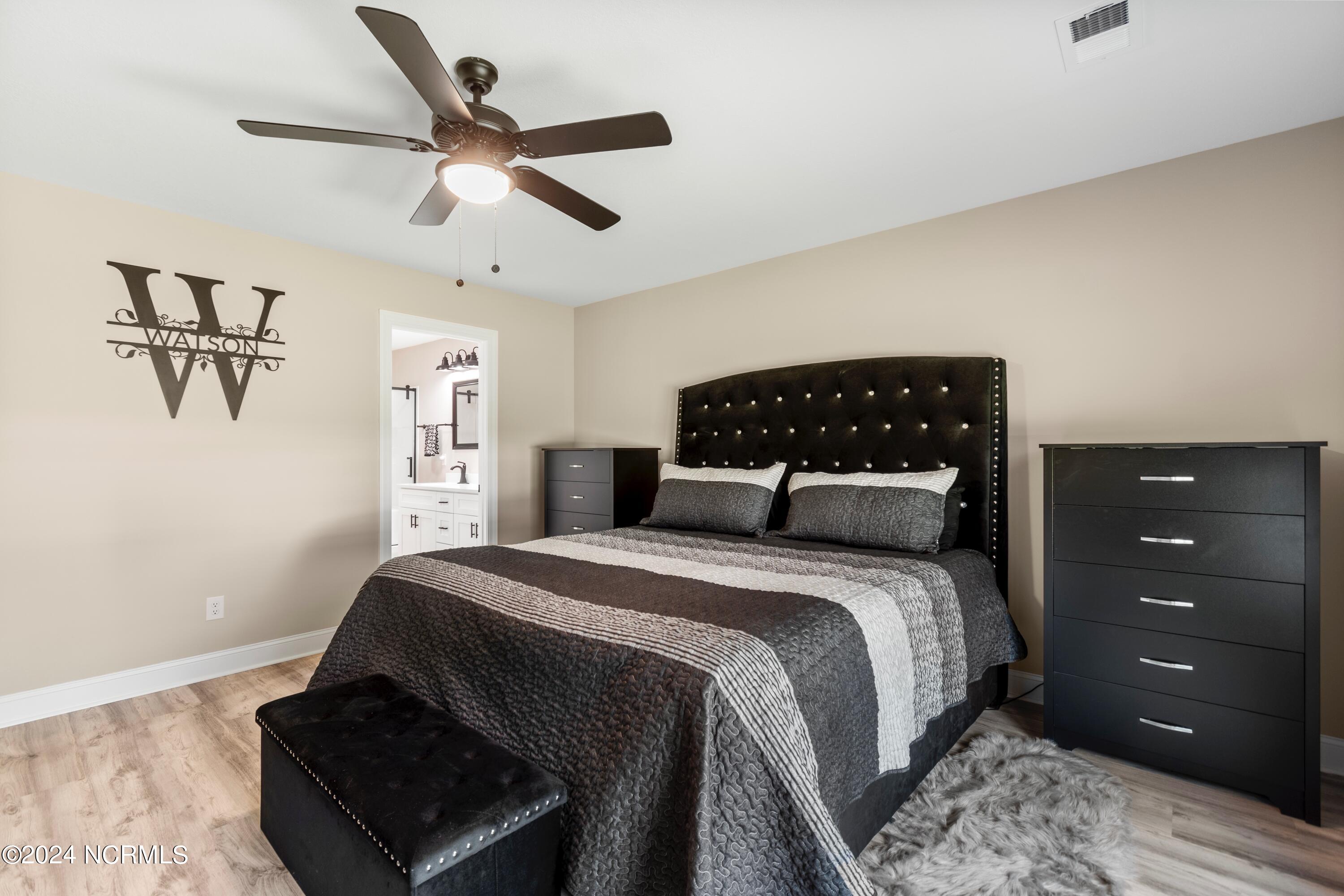 185 Boundary Loop Road Northwest Calabash, NC 28467 - Photo 20 of 56 Master bedroom