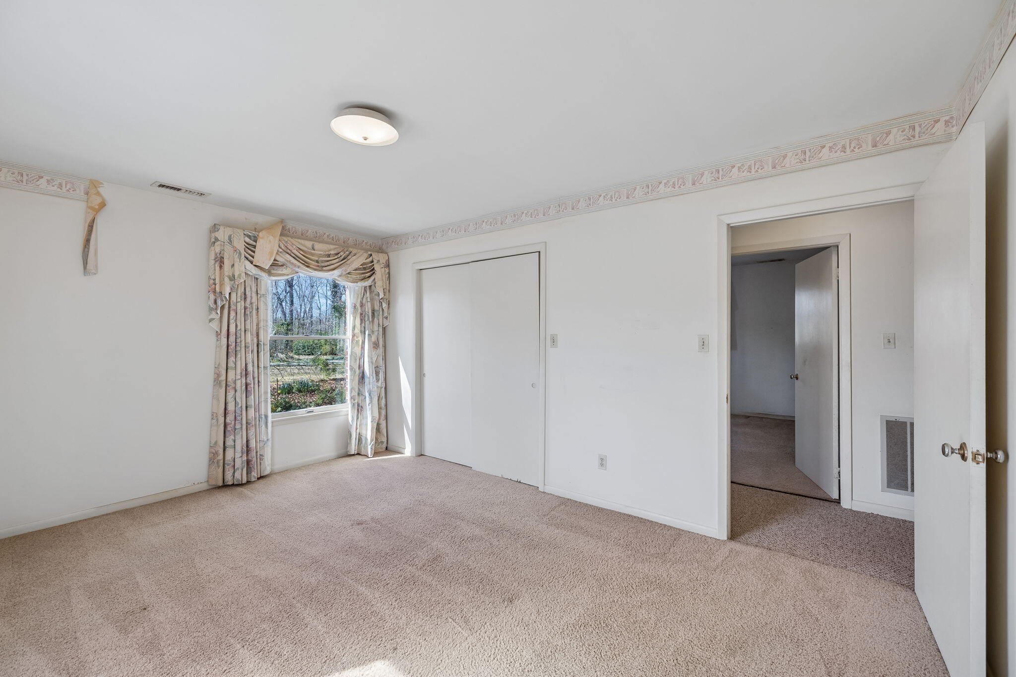 766 Bowling Alley Road Manchester, TN 37355 - Photo 31 of 57 a view of a livingroom with a ceiling fan and window