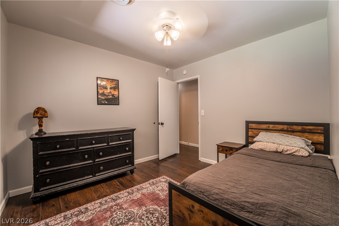 1324 Appaloosa Road Boulder City, NV 89005 - Photo 26 of 42 Rich hardwood floors complement neutral walls in this restful sleeping area.