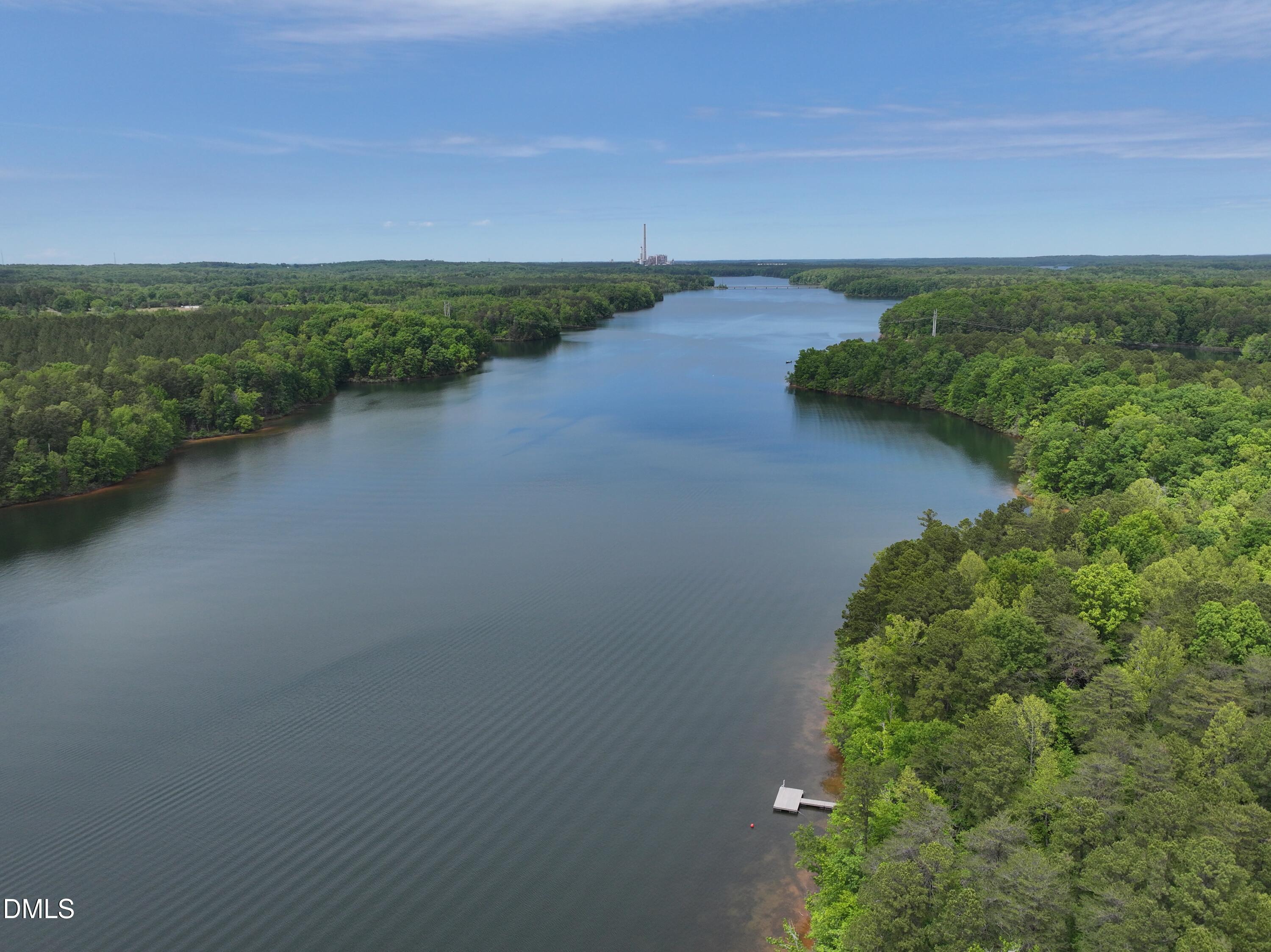 75 Max Finn Lane Roxboro, NC 27574 - Photo 16 of 17 a view of a lake with a city