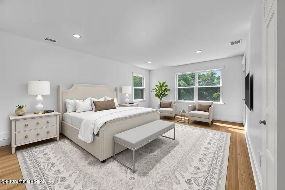 717 Holmdel Road Holmdel, NJ 07733 - Photo 26 of 39 a bed room with a bed and a window