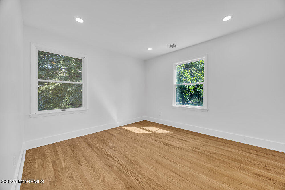 717 Holmdel Road Holmdel, NJ 07733 - Photo 28 of 39 an empty room with a window