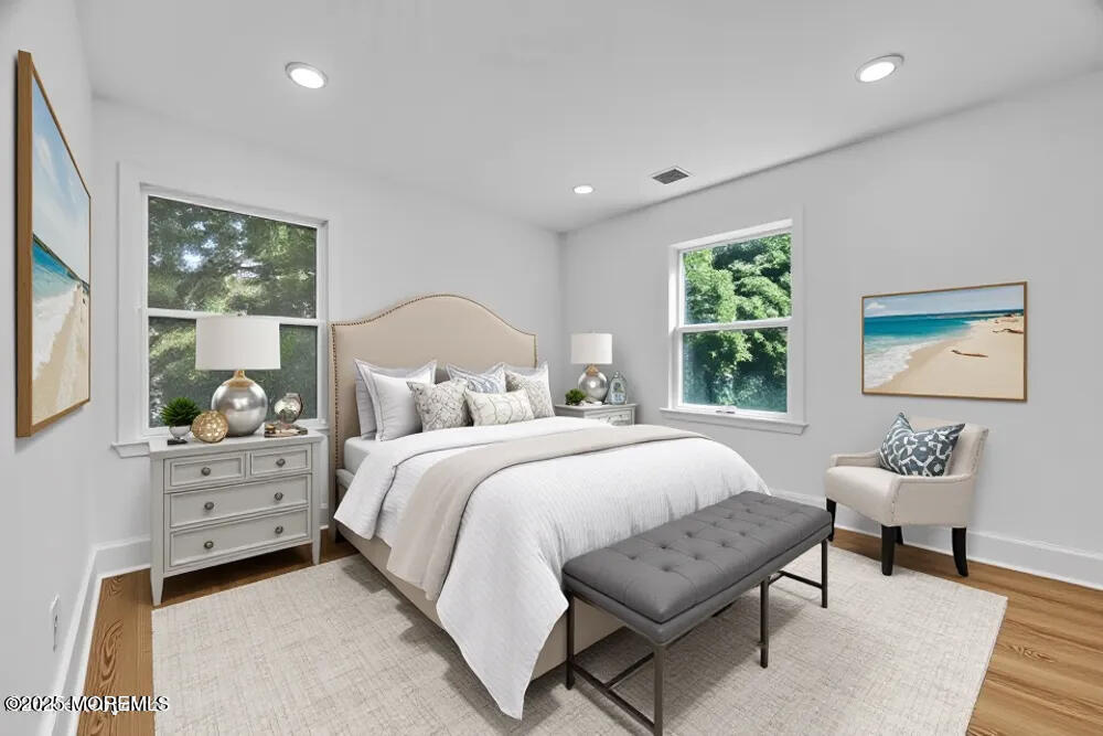 717 Holmdel Road Holmdel, NJ 07733 - Photo 29 of 39 a bedroom with bed and windows