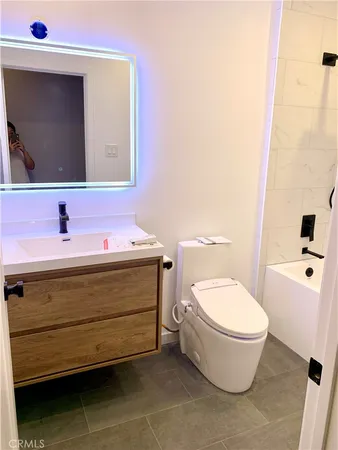 a bathroom with a sink and a toilet