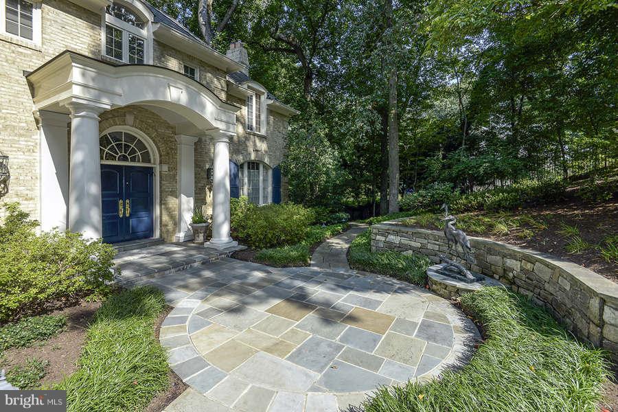 9017 Clewerwall Drive Bethesda, MD 20817 - Photo 2 of 27 a view of a house with a garden