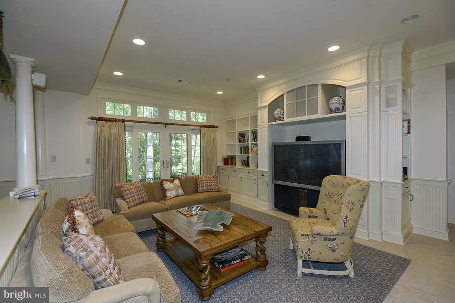 9017 Clewerwall Drive Bethesda, MD 20817 - Photo 20 of 27 a living room with furniture rug and window