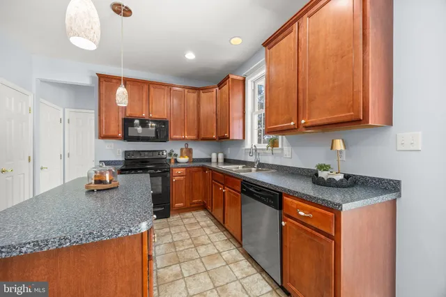 a spacious bathroom with a double vanity sink and a mirror