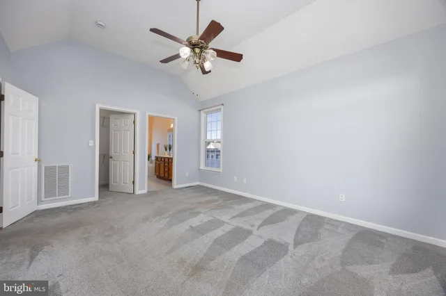 a view of a balcony with wooden floor