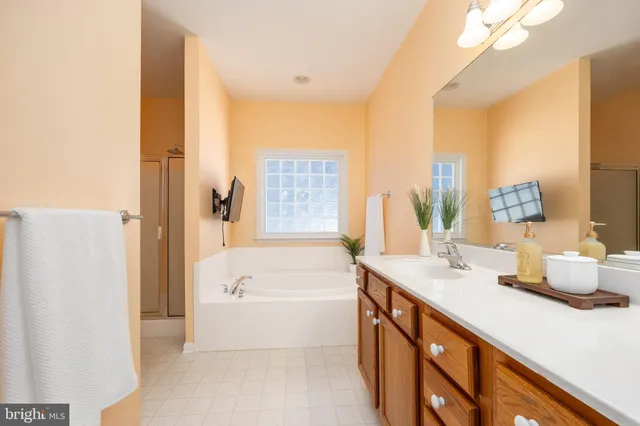 a view of a yard with wooden fence