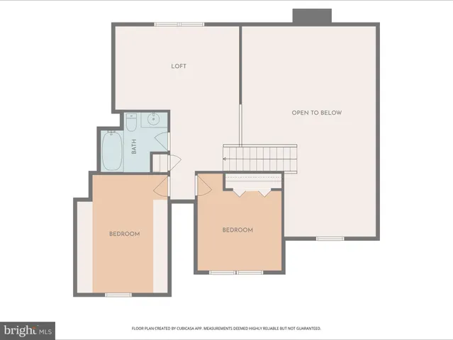 a view of a livingroom with furniture and an entryway