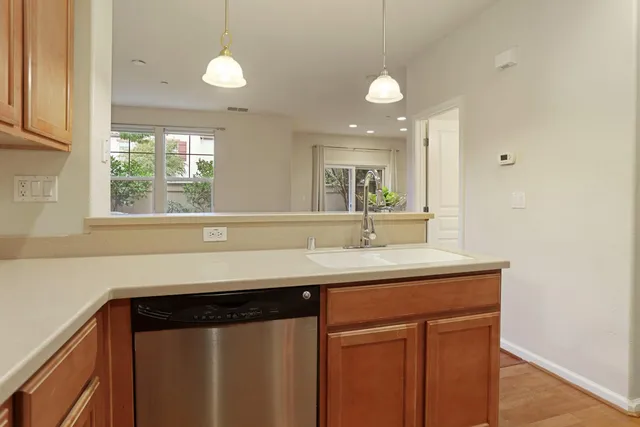 a kitchen with a stove and a microwave