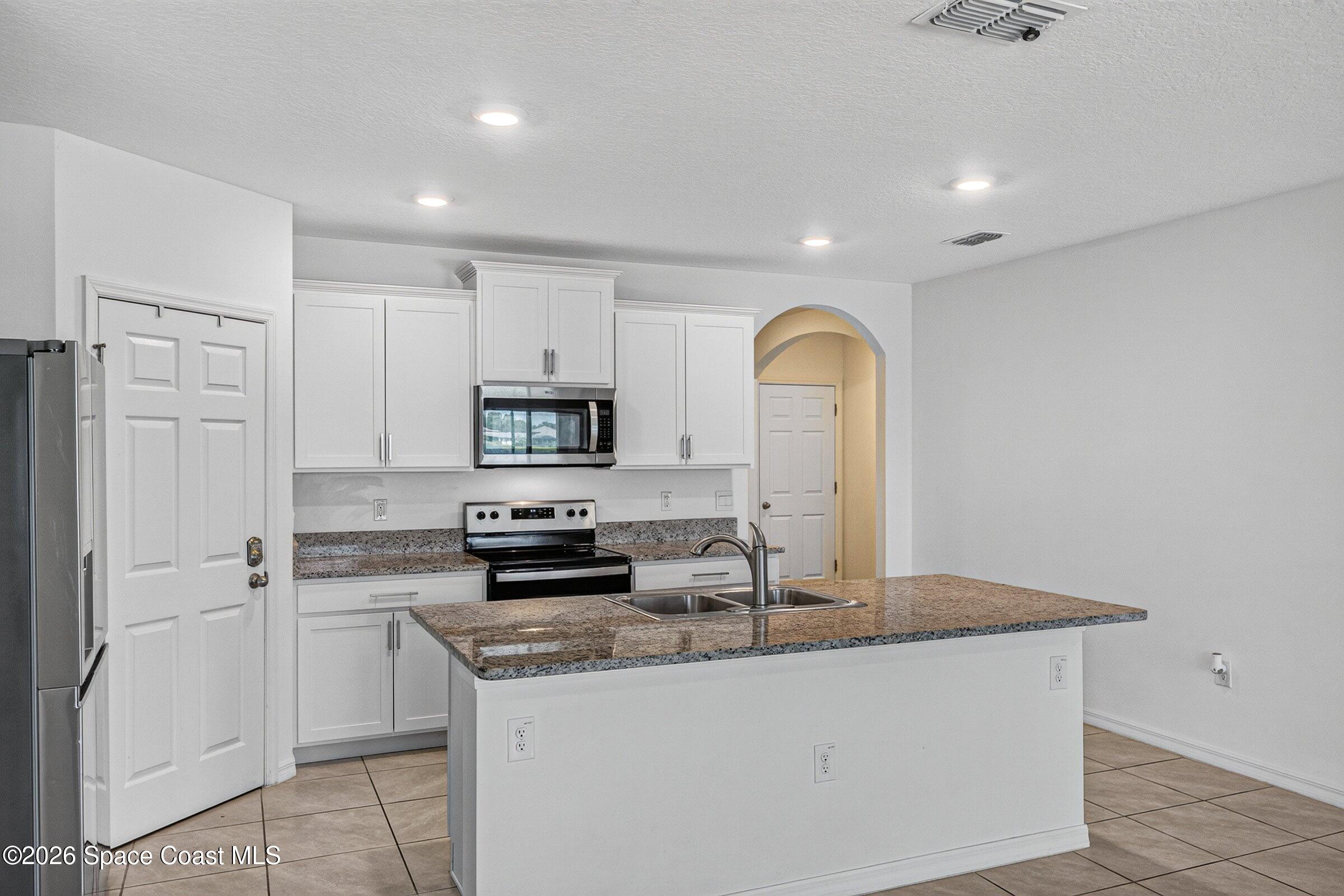 3419 Foggy Mist Road Southeast Palm Bay, FL 32909 - Photo 4 of 39 Kitchen