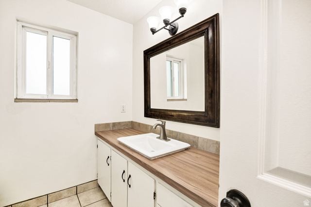 365 South Center Street Fielding, UT 84311 - Photo 19 of 41 Bathroom with vanity and light tile patterned floors