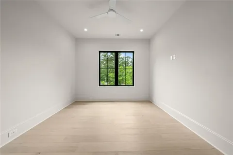 a view of hallway with a window