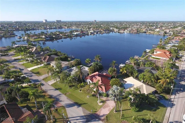 an aerial view of a houses with outdoor space