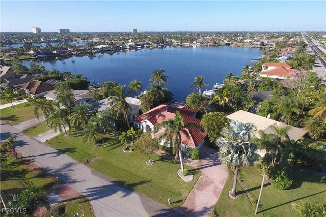 an aerial view of a houses with outdoor space
