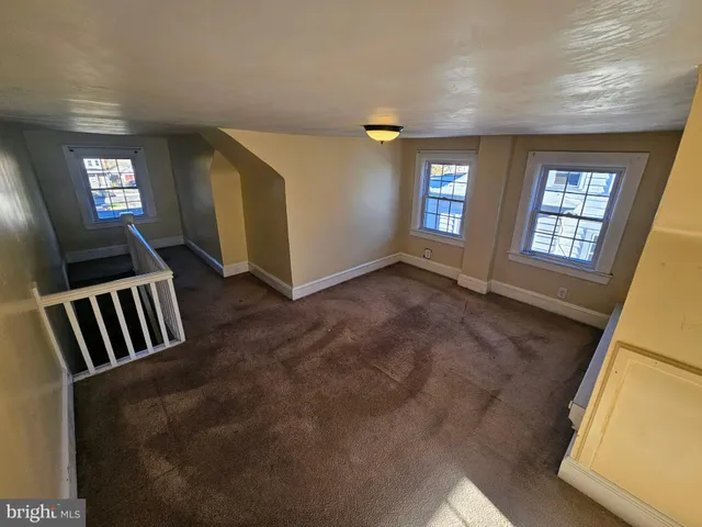 a picture of a room with windows