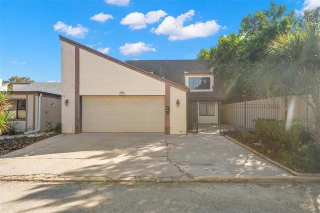a view of a back yard of the house