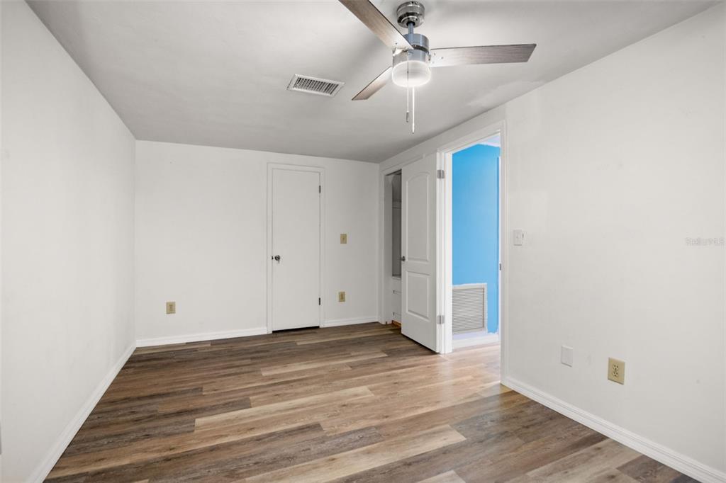 7500 Rocky Point Drive Hudson, FL 34667 - Photo 34 of 37 wooden floor in an empty room