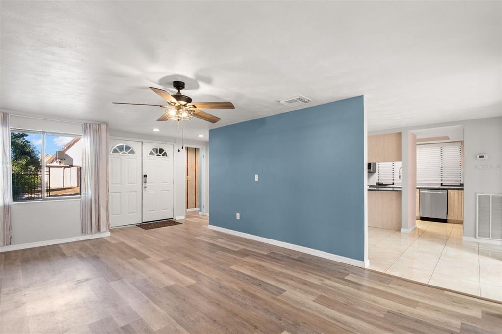 7500 Rocky Point Drive Hudson, FL 34667 - Photo 6 of 37 a view of a livingroom with a ceiling fan and window