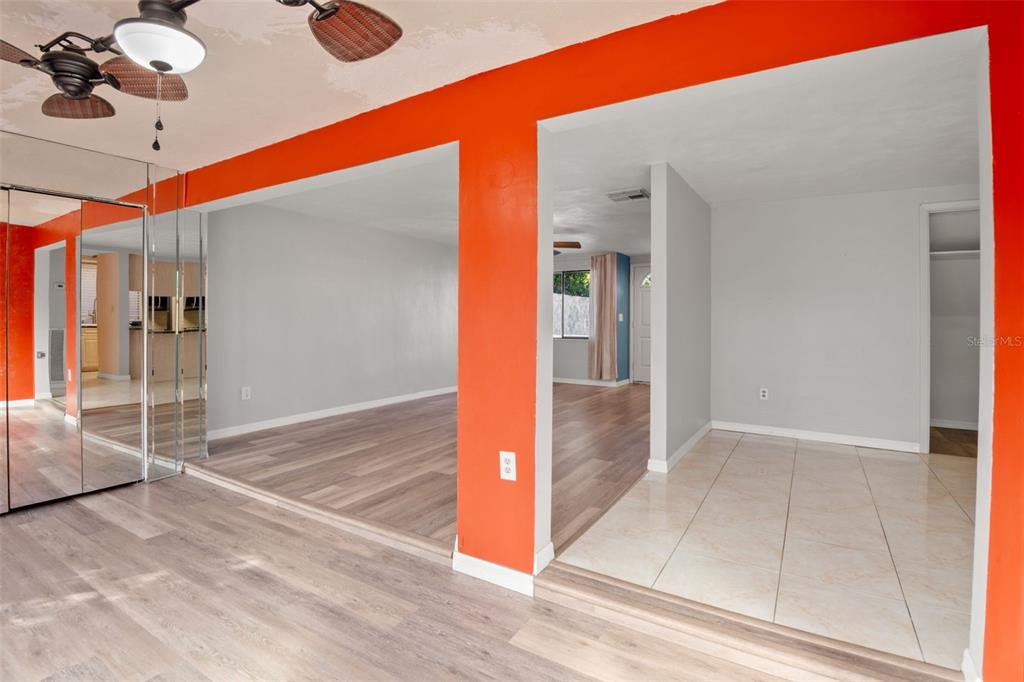 7500 Rocky Point Drive Hudson, FL 34667 - Photo 10 of 37 an empty room with wooden floor