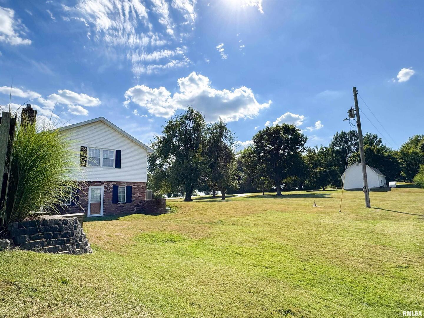 2885 State Route 146 Anna, IL 62906 - Photo 19 of 46 a view of a house with a swimming pool