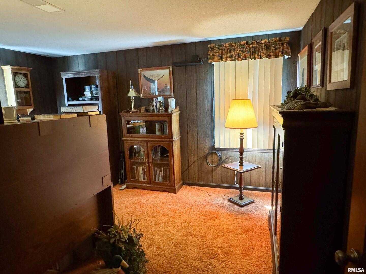 2885 State Route 146 Anna, IL 62906 - Photo 39 of 46 a bed room with a bed and a television